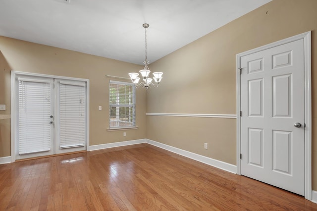 55 Hopkins Landing Rd, Quincy, FL 32351 - spare room with light wood-style floors, baseboards, and a chandelier