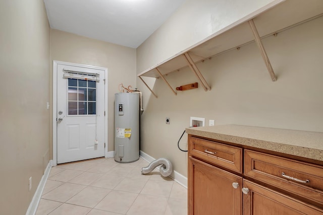 55 Hopkins Landing Rd, Quincy, FL 32351 - laundry room featuring water heater, hookup for an electric dryer, washer hookup, baseboards, and cabinet space