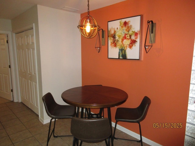 2738 W Tharpe St Unit 2101, Tallahassee, FL 32303 - dining area featuring baseboards and tile patterned flooring
