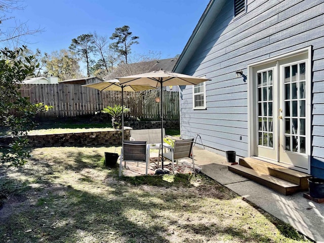 view of yard with french doors