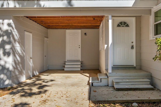 entrance to property with a carport