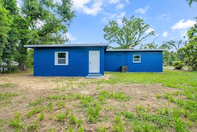 1722 Eisenhower St, Tallahassee, FL 32310 - back of house with cooling unit and a yard