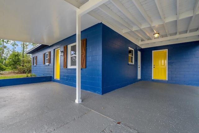 1722 Eisenhower St, Tallahassee, FL 32310 - entrance to property with an attached carport and concrete block siding