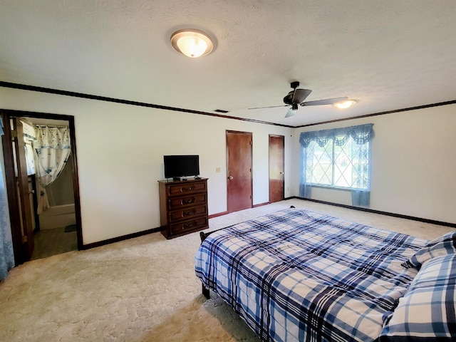 2917 Glover Carlton Rd, Perry, FL 32348 - bedroom with light colored carpet, baseboards, crown molding, a textured ceiling, and ceiling fan
