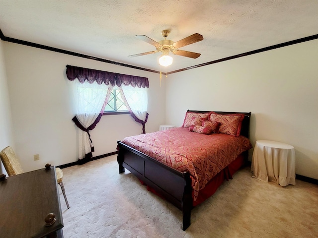 2917 Glover Carlton Rd, Perry, FL 32348 - bedroom with ornamental molding, light carpet, baseboards, a ceiling fan, and a textured ceiling