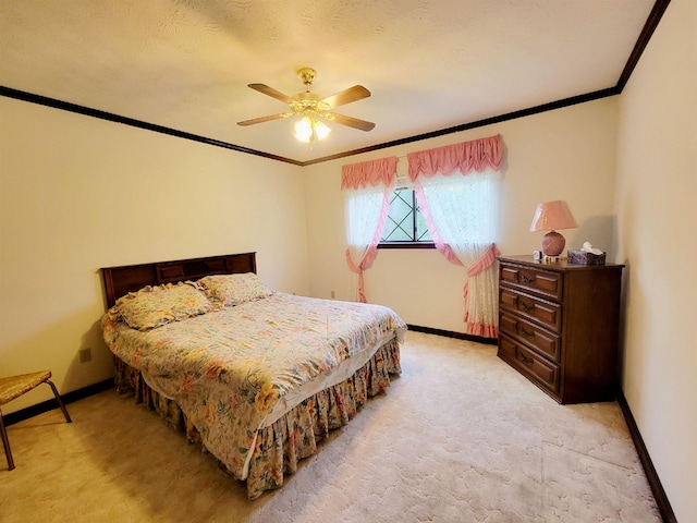 2917 Glover Carlton Rd, Perry, FL 32348 - bedroom with ornamental molding, baseboards, light colored carpet, and ceiling fan