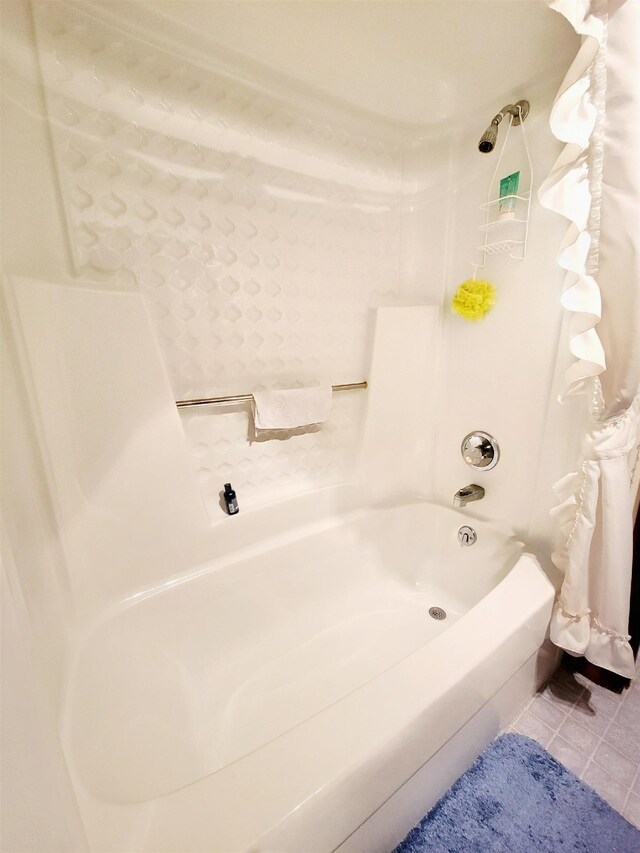 2917 Glover Carlton Rd, Perry, FL 32348 - full bath with tile patterned flooring and  shower combination