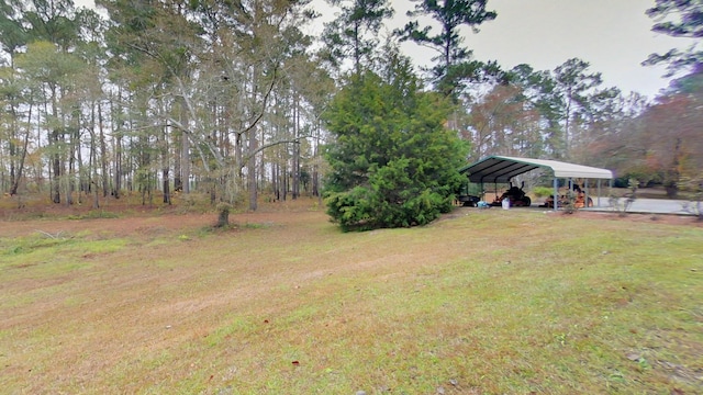 view of yard with a carport