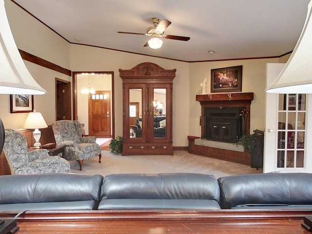 carpeted living room featuring ceiling fan and lofted ceiling