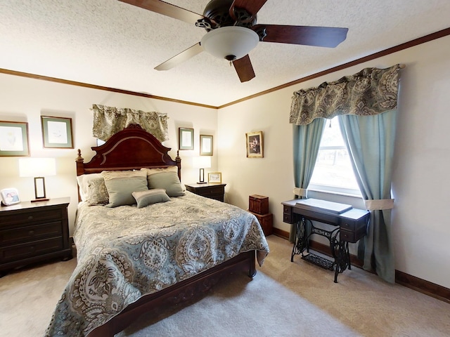 carpeted bedroom with a textured ceiling, ceiling fan, and ornamental molding