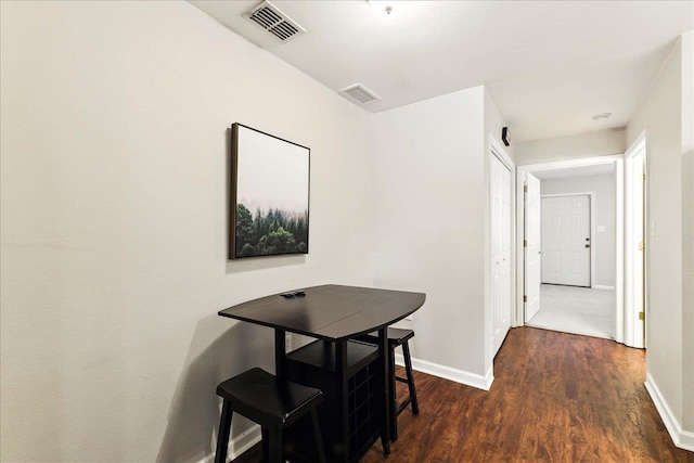 2738 W Tharpe St Unit 2302, Tallahassee, FL 32303 - dining area featuring wood finished floors and baseboards