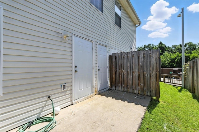 2738 W Tharpe St Unit 2302, Tallahassee, FL 32303 - view of exterior entry with a patio area