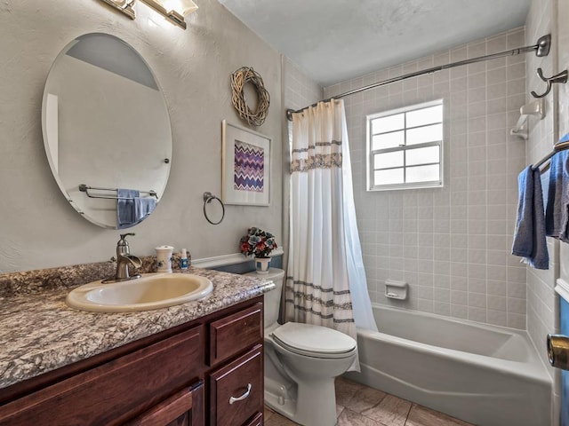 full bathroom featuring shower / tub combo with curtain, vanity, toilet, and tile patterned floors