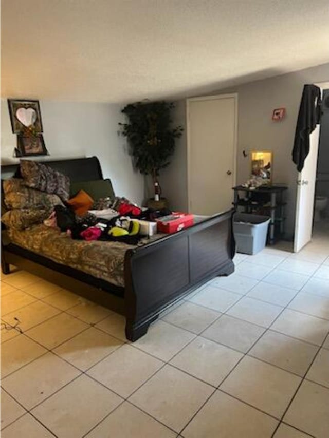 212 Susan St, Perry, FL 32348 - bedroom featuring light tile patterned flooring