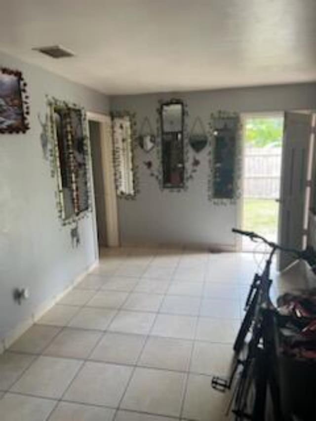 212 Susan St, Perry, FL 32348 - unfurnished room featuring light tile patterned floors