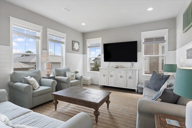 living room with light hardwood / wood-style flooring