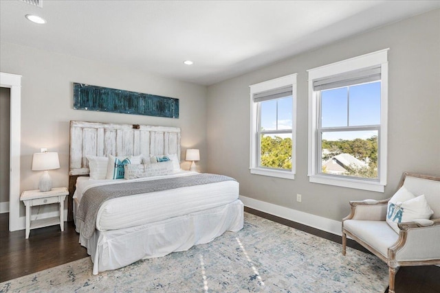 bedroom featuring dark wood-type flooring