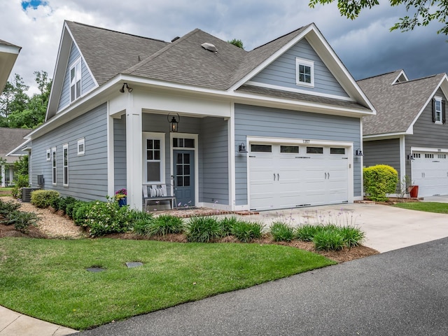 1207 Braemore Way, Tallahassee, FL 32308 - view of front of home featuring a shingled roof, concrete driveway, a porch, and a garage