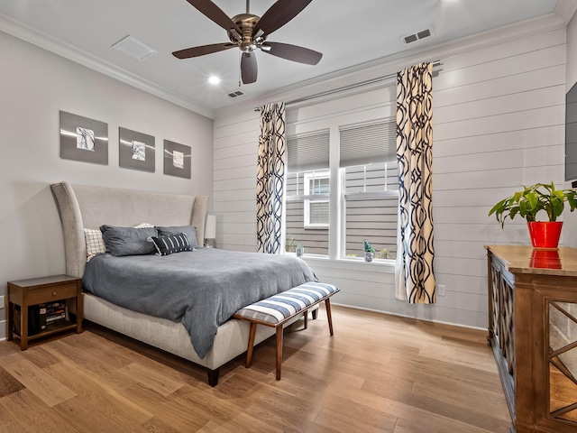 1207 Braemore Way, Tallahassee, FL 32308 - bedroom featuring crown molding, light wood-type flooring, recessed lighting, wooden walls, and a ceiling fan