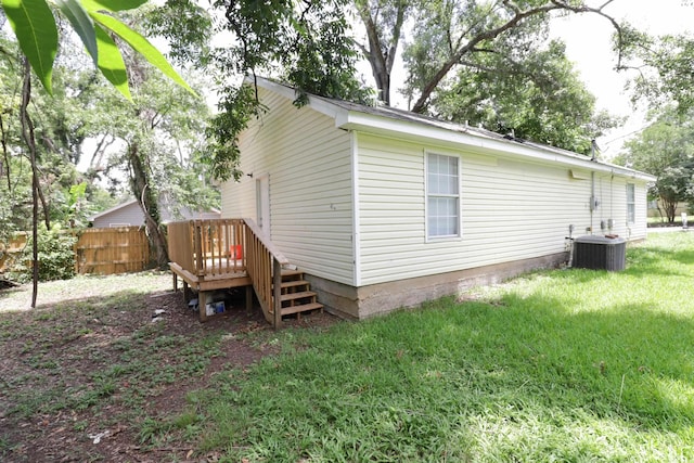 1944 Pasco St, Tallahassee, FL 32310 - view of home's exterior with central air condition unit and a wooden deck