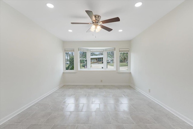 empty room with a ceiling fan, recessed lighting, and baseboards