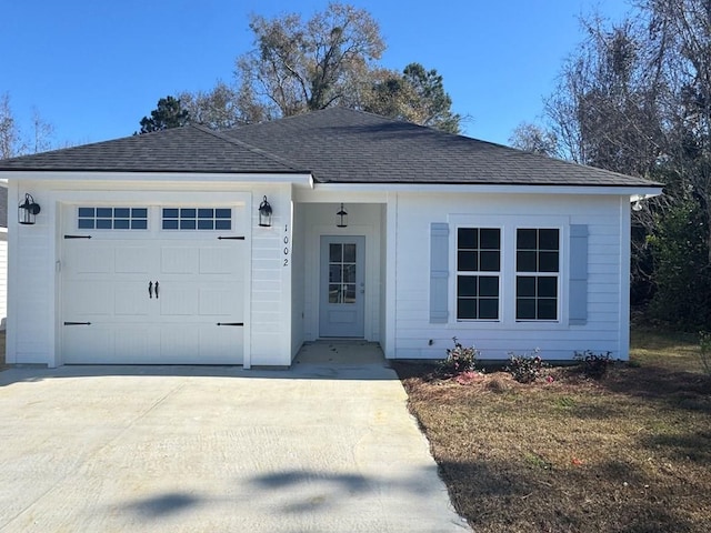 ranch-style home with a garage