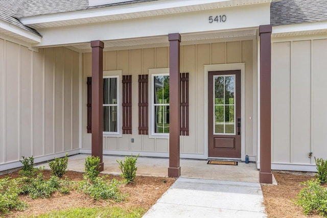 property entrance featuring covered porch