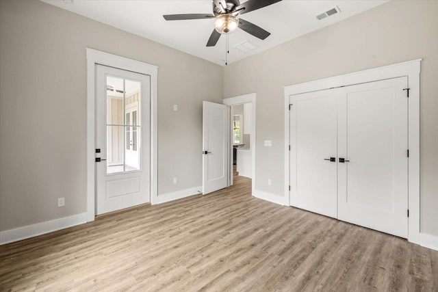 unfurnished bedroom featuring ceiling fan and light hardwood / wood-style floors