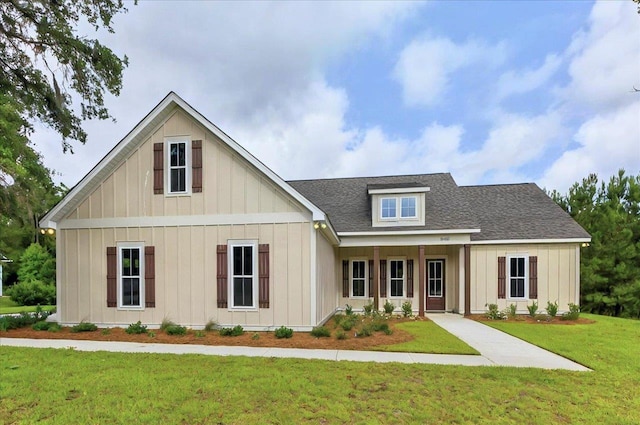 5410 Peace Dove Trl, Tallahassee, FL 32311 - modern farmhouse style home featuring board and batten siding, a front lawn, and roof with shingles