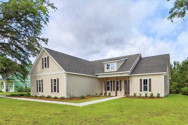 5410 Peace Dove Trl, Tallahassee, FL 32311 - modern farmhouse featuring a front yard, board and batten siding, and a shingled roof