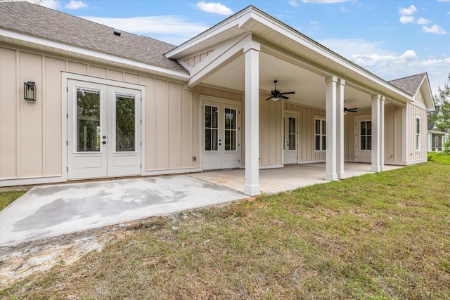 back of house featuring french doors, a yard, ceiling fan, and a patio area