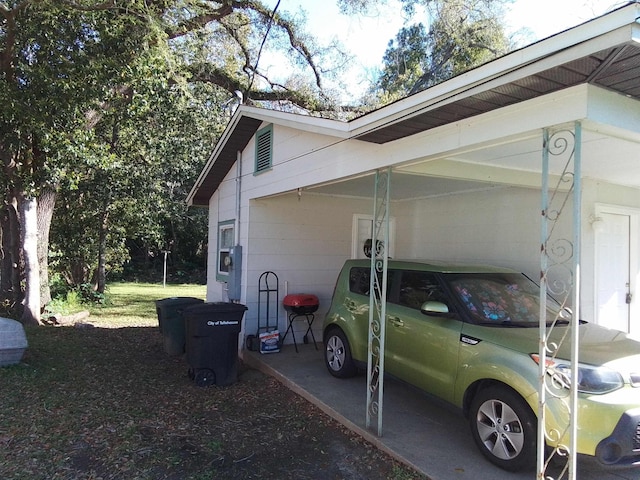1508 Pepper Dr, Tallahassee, FL 32304 - view of side of property with a carport