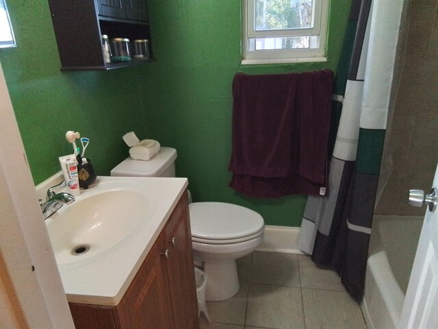 1508 Pepper Dr, Tallahassee, FL 32304 - full bath with toilet, tile patterned flooring, vanity, and baseboards
