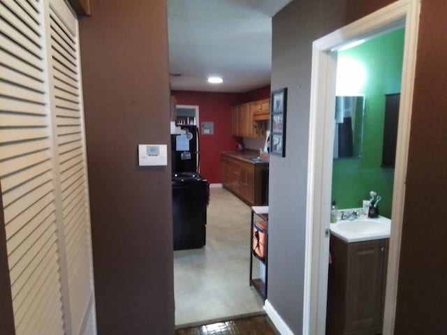 1508 Pepper Dr, Tallahassee, FL 32304 - corridor featuring a sink, baseboards, and recessed lighting