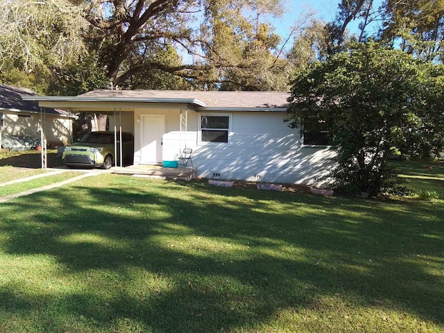 1508 Pepper Dr, Tallahassee, FL 32304 - view of front of property with a front yard and an attached carport