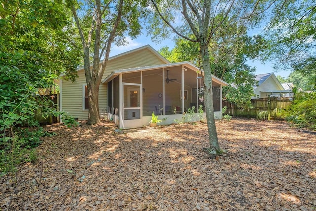 5529 Green Meadows Ct, Tallahassee, FL 32303 - back of property with a sunroom and ceiling fan