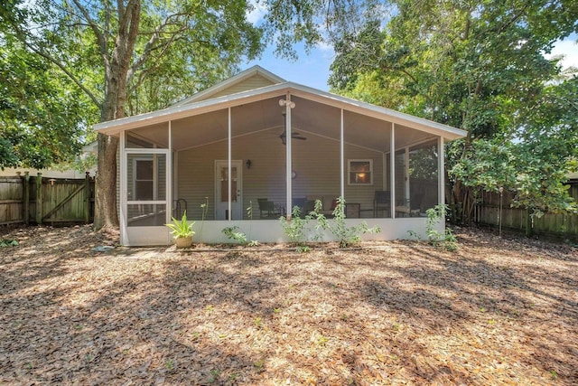 5529 Green Meadows Ct, Tallahassee, FL 32303 - back of property featuring a sunroom