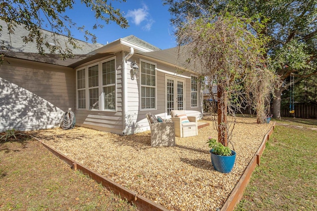 view of home's exterior with french doors