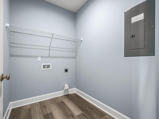 10356 Crystalline Ct, Tallahassee, FL 32305 - washroom featuring electric panel, hookup for a washing machine, dark wood finished floors, baseboards, and electric dryer hookup
