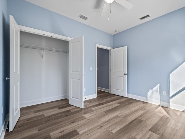10356 Crystalline Ct, Tallahassee, FL 32305 - unfurnished bedroom featuring wood finished floors, a closet, baseboards, and ceiling fan