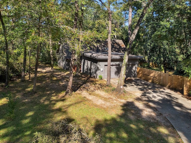 view of yard featuring a garage