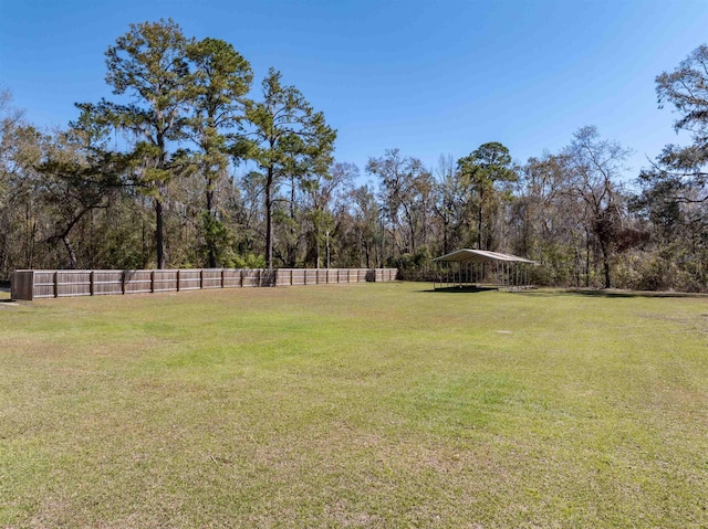 view of yard with a carport