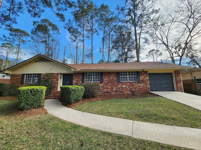 ranch-style house featuring crawl space, driveway, a garage, and brick siding