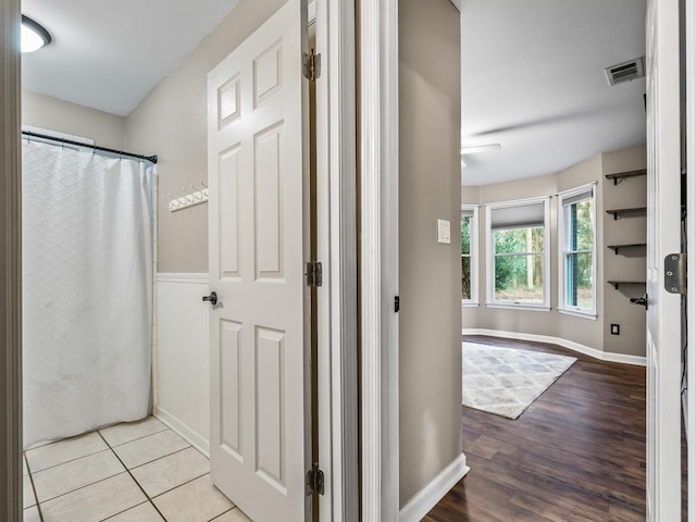 bathroom with tile patterned floors