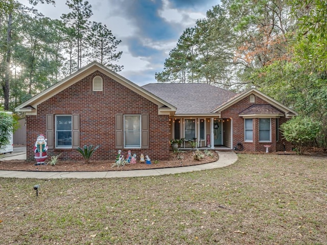 ranch-style house with a front yard