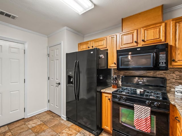 kitchen with tasteful backsplash, ornamental molding, light stone counters, and black appliances