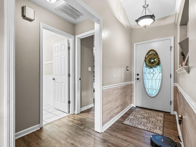 entryway with hardwood / wood-style flooring