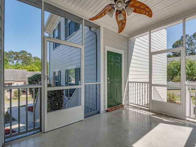 2123 Fernleigh Dr, Tallahassee, FL 32311 - unfurnished sunroom with ceiling fan and plenty of natural light