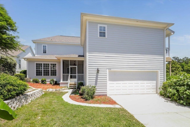 2123 Fernleigh Dr, Tallahassee, FL 32311 - view of front of property with a garage, concrete driveway, a front lawn, a sunroom, and roof with shingles