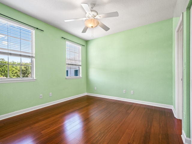 2123 Fernleigh Dr, Tallahassee, FL 32311 - empty room featuring baseboards, dark wood finished floors, and ceiling fan
